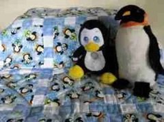 penguins on quilt