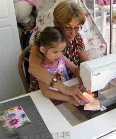 Abby Sewing with Grandma1