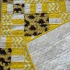 golden dinosaurs baby quilt detail 5