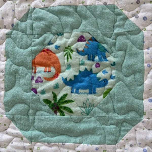 dinosaur world baby quilt detail 1