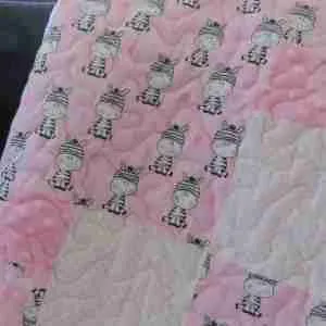 zebras in pink and gray baby quilt