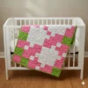 rose baby quilt on crib