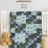 Dinosaur dynamite baby quilt