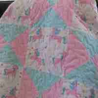 unicorns at play baby quilt