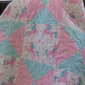 unicorns at play baby quilt