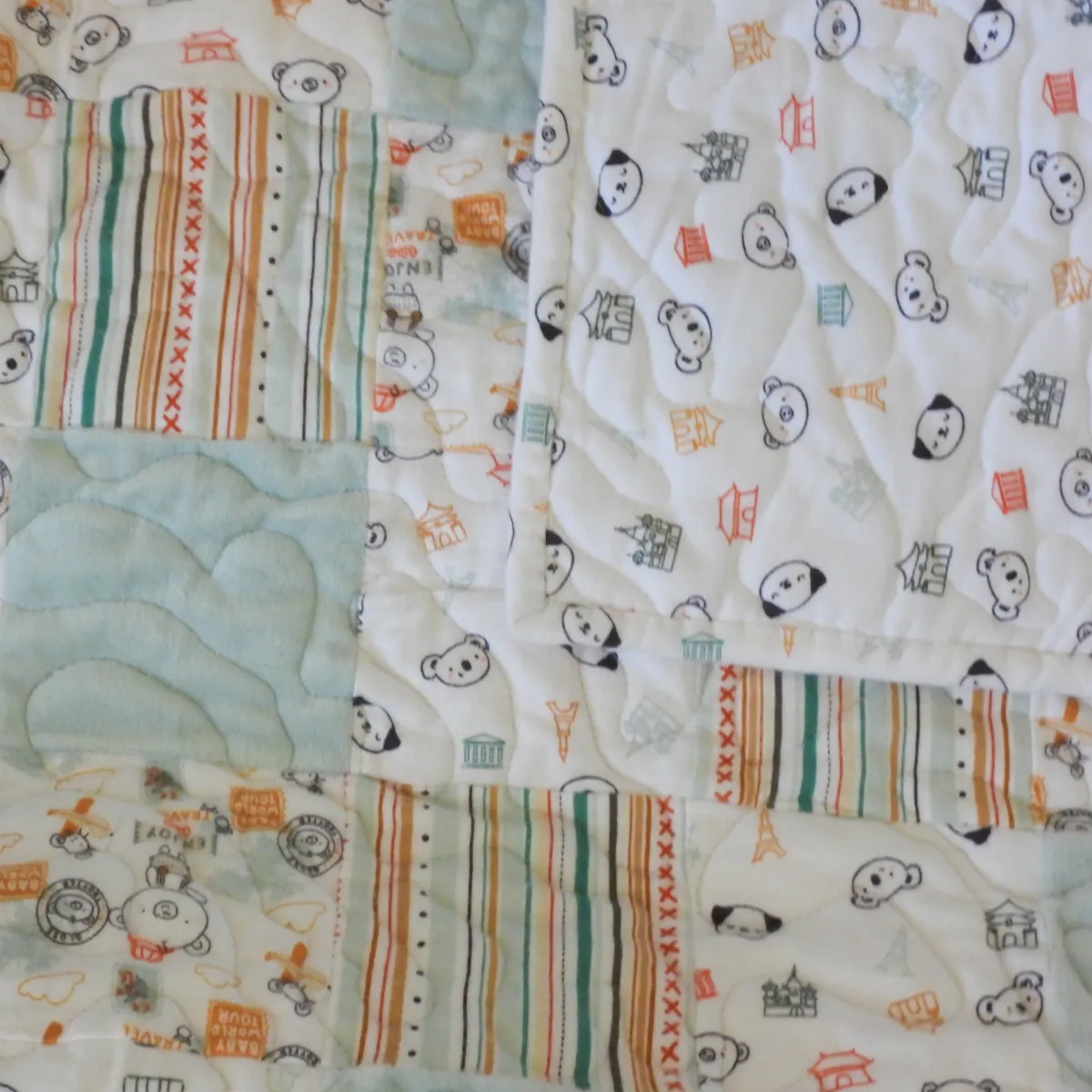 Animal Travelers Baby Quilt with folded backing