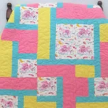 unicorns and clouds baby quilt