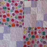 lavender flowers and bugs quilt