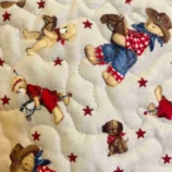 Cowboy Bear Baby Quilt closeip of bear on hobby horse