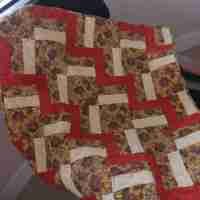 sunflowers baby quilt on chair