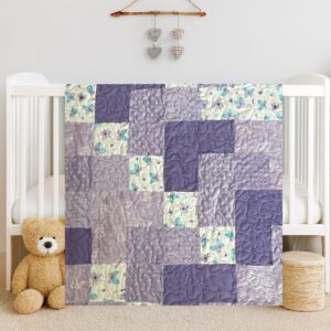 Butterfly Patches Baby Quilt on white crib with bear