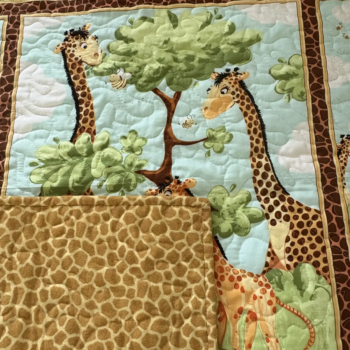 new giraffe family baby quilt detail 5