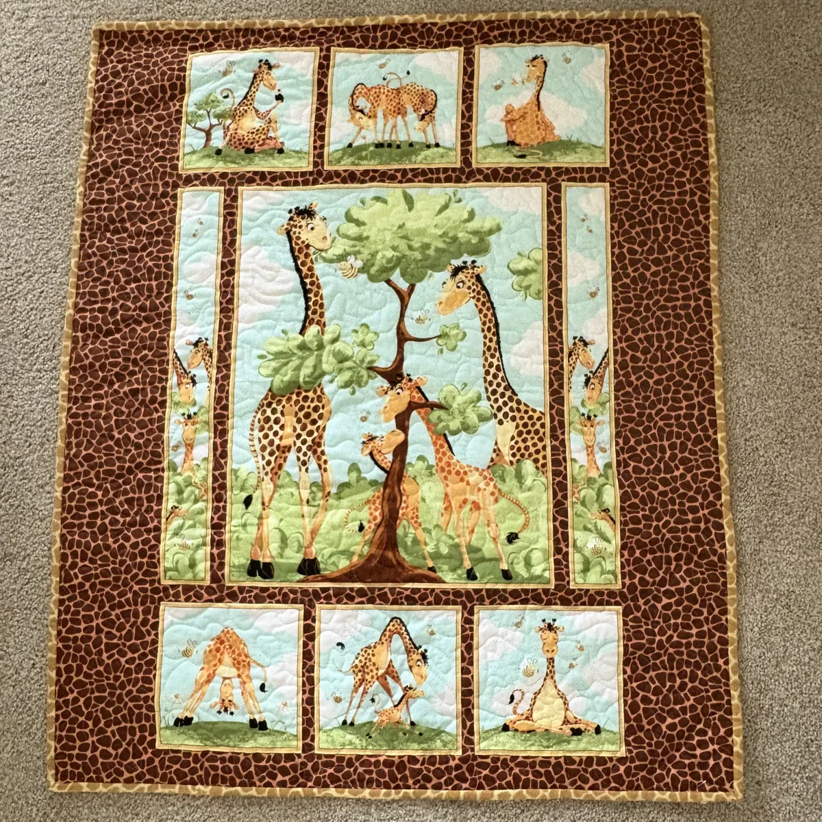 new giraffe family baby quilt full view