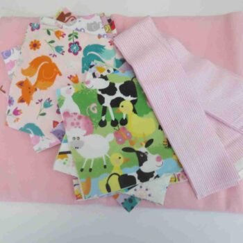 Pink I Spy Quilt Kit shown with optional backing