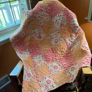 peach flowers baby quilt product image