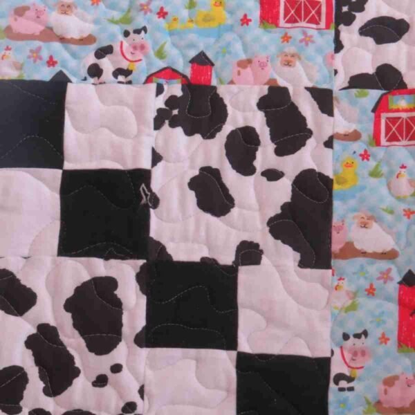 machine dry low is important when caring for a handmade baby quilt