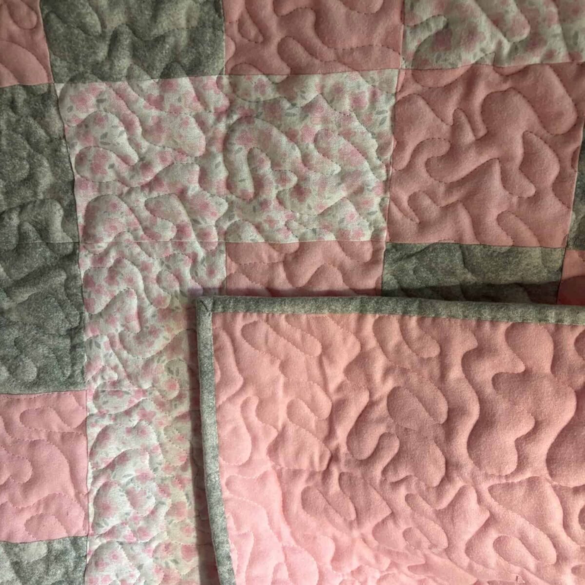 Blush & Bloom Baby Quilt detail of backing