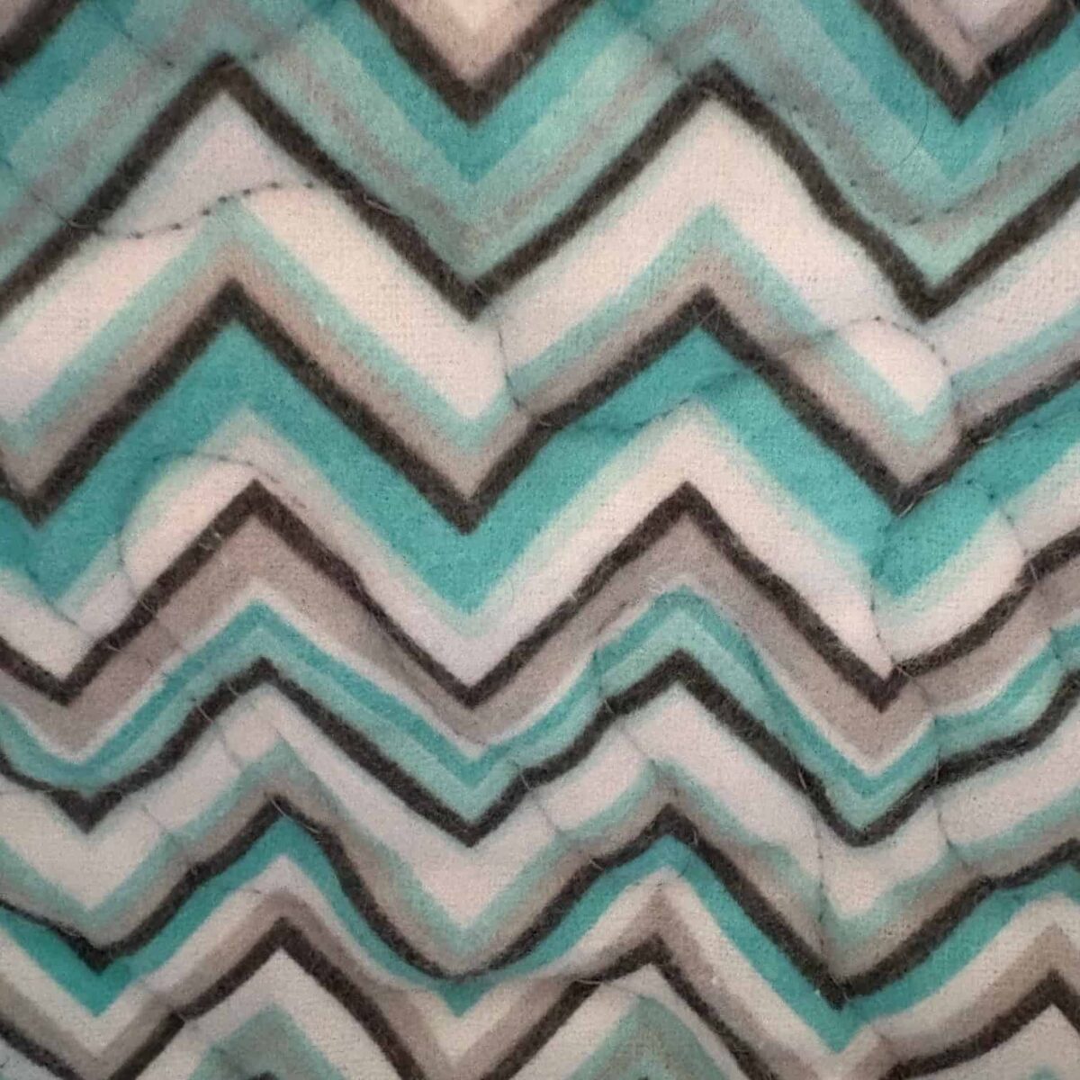 Coastal Calm Baby Quilt closeup of teal and gray chevrons