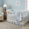 blue trucks baby quilt on crib