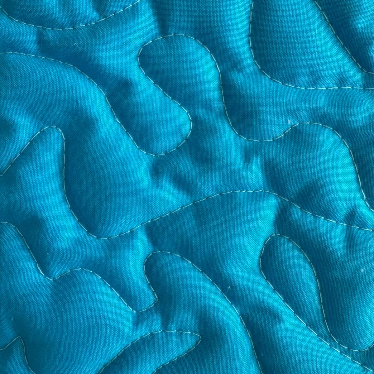 Unicorn Patchwork Baby Quilt detail of blue square