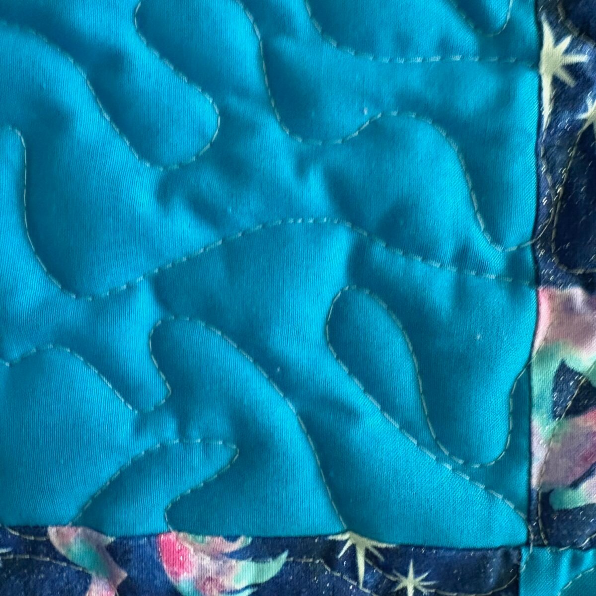 Unicorn Patchwork Baby Quilt detail of solid square