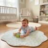 Baby on bunny garden mat