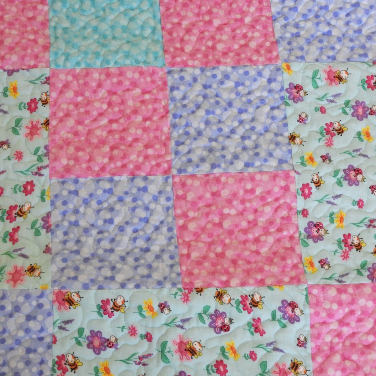 Bright Blooms Baby Quilt detail of purple squares