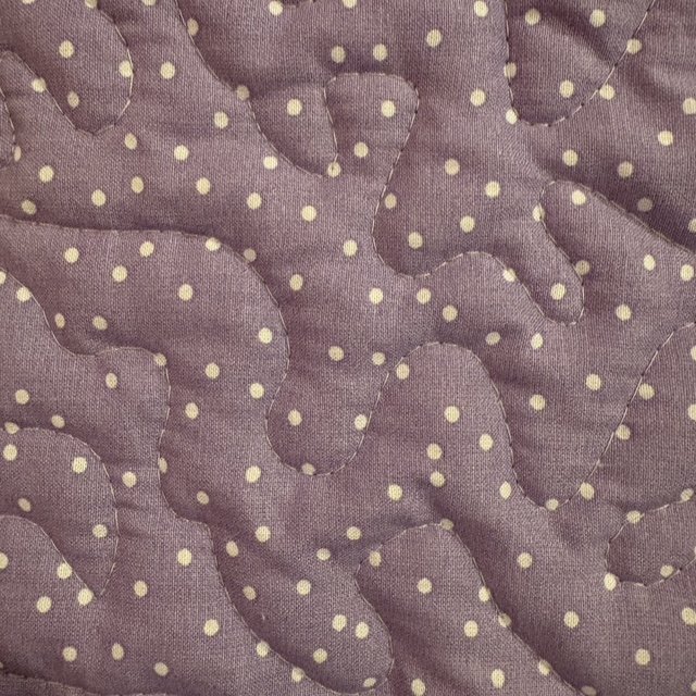 Handmade Unicorn Flannel Quilt detail of purple blocks